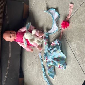 Comes with doll chlothes baby doll head band and